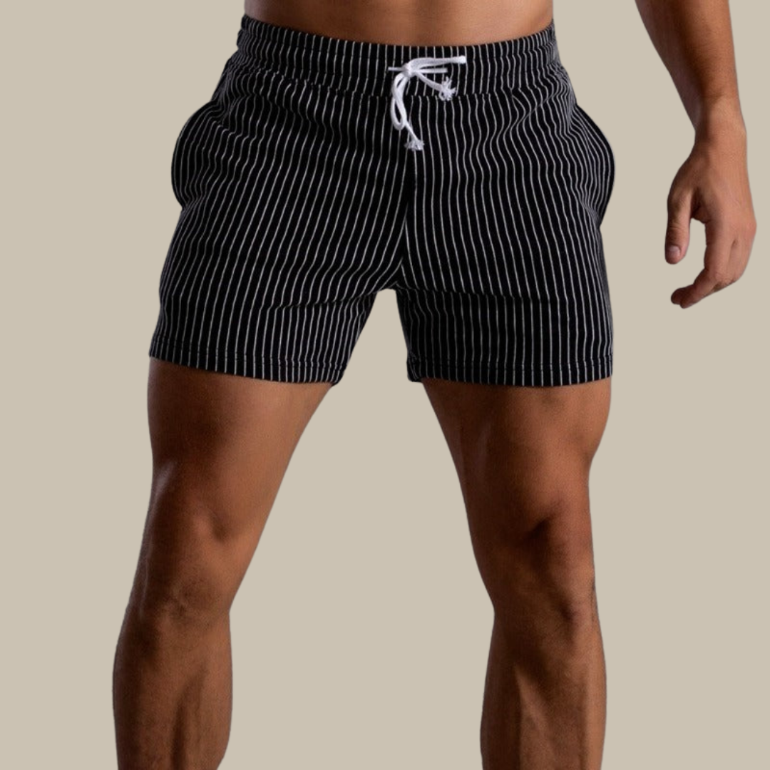 Stylish men's swim shorts. Fashionable quick-dry beachwear for pool, vacation & summer comfort.