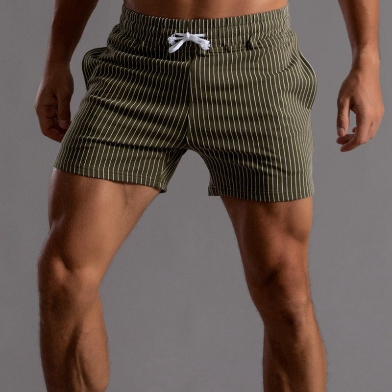 Durable ripstop polyester men's swim shorts. Quick-drying athletic swimwear for beach & pool.