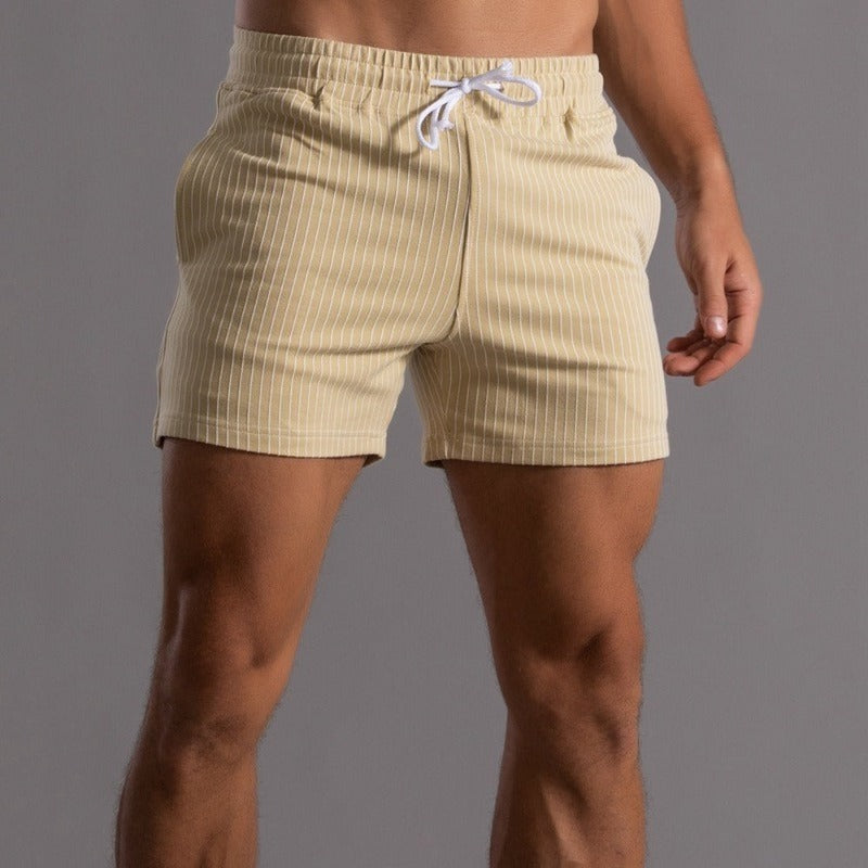 Comfortable men's quick-drying swim shorts. Ripstop polyester for active beach days & ultimate ease.