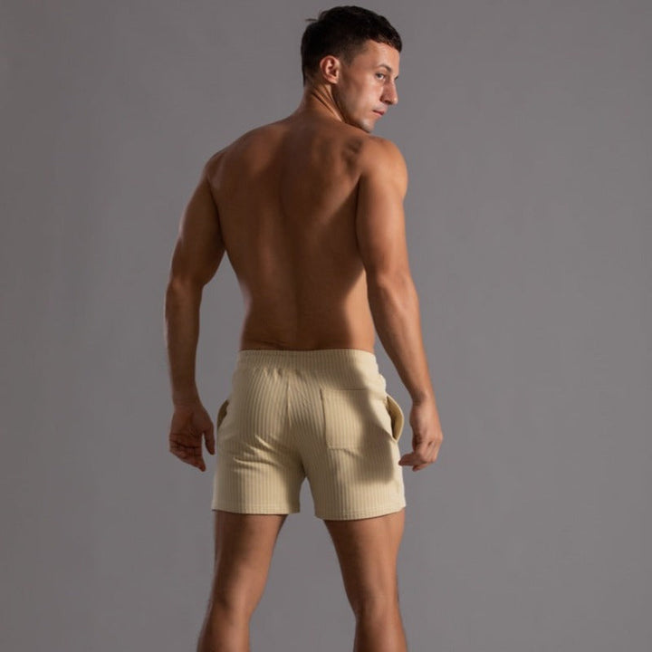 Athletic men's quick-drying swim shorts. Ripstop polyester for active swimming, beach sports & pool.