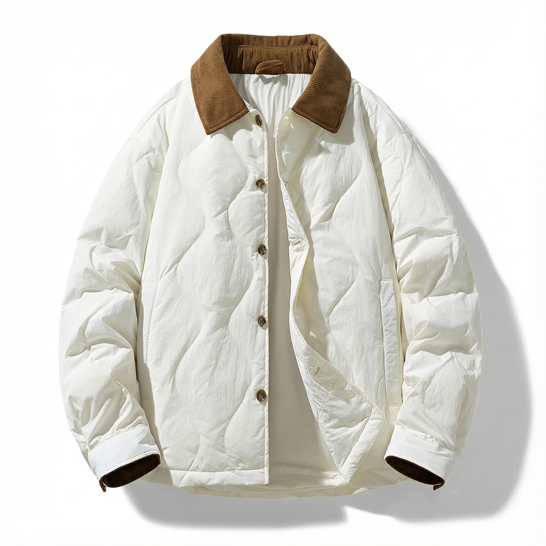 Image of a man wearing a smart quilted cotton jacket with a corduroy collar, styled for casual outings
