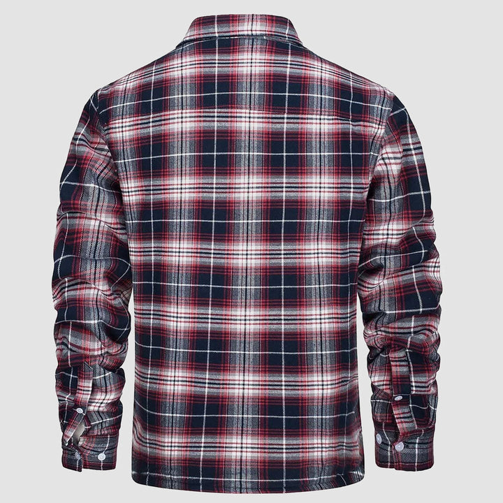 Styled shot of a men's casual flannel fleece lined jacket with blue jeans, perfect for an everyday winter look