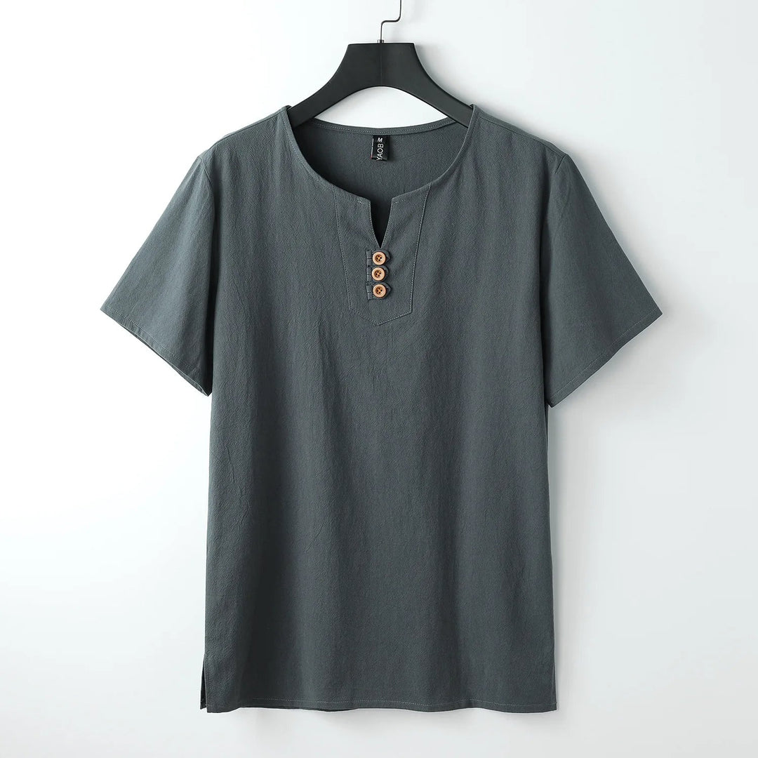 Close-up of a men's button-neck t-shirt, showcasing the v-neck style and relaxed, comfortable fit.