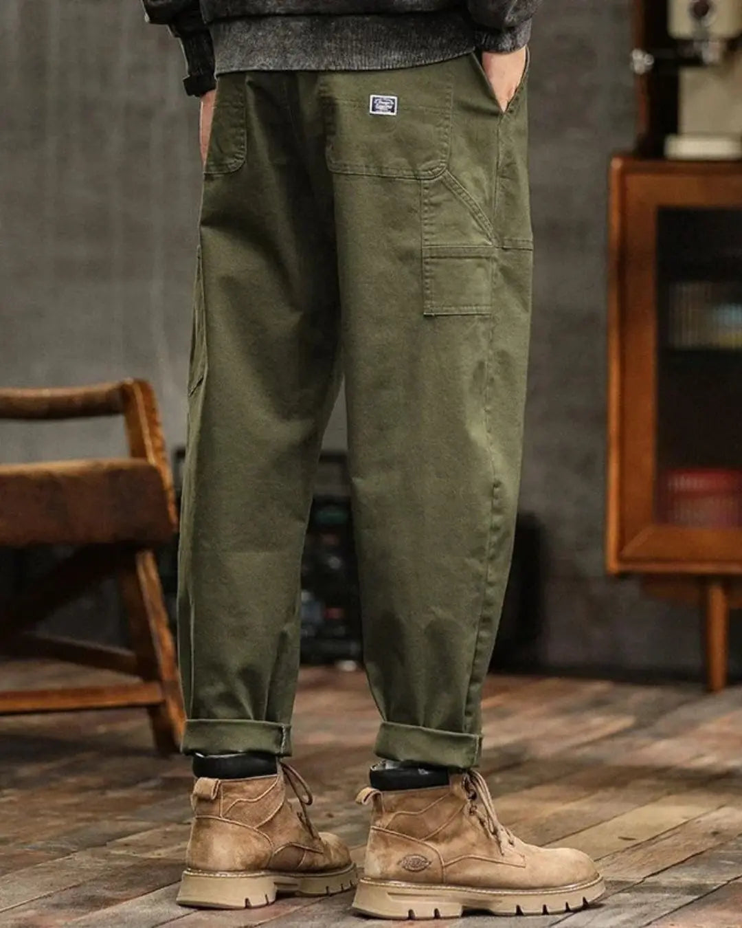 Utility men's cargo pants with multi-pockets, relaxed fit, durable for outdoor use.