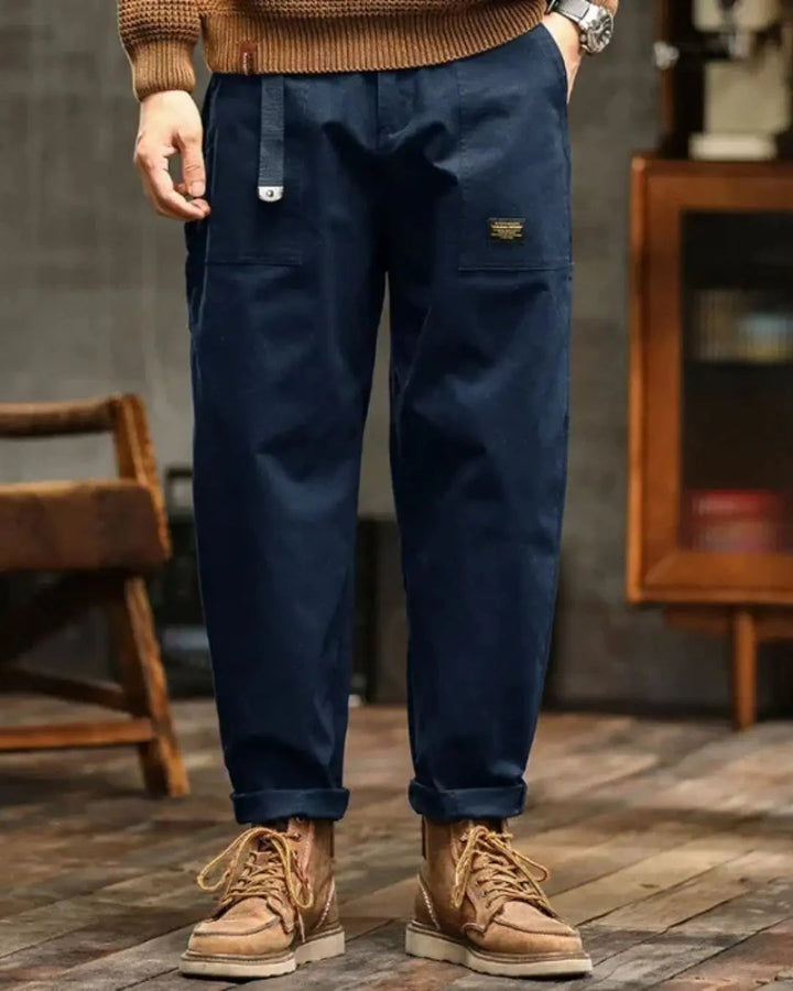 Stylish men's relaxed fit cargo pants, blending fashion with practical multi-pocket utility.