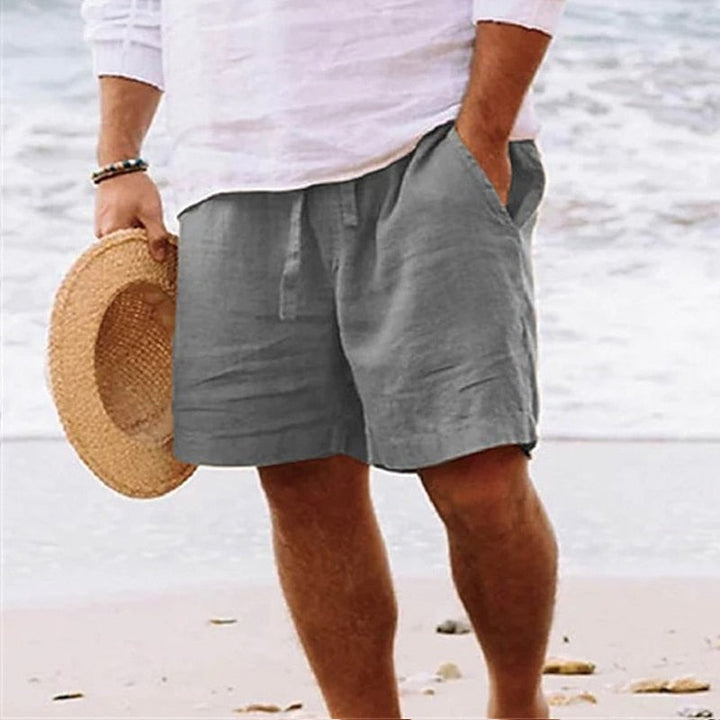 Comfortable men's casual drawstring shorts, relaxed fit chino style, perfect for warm summer days.