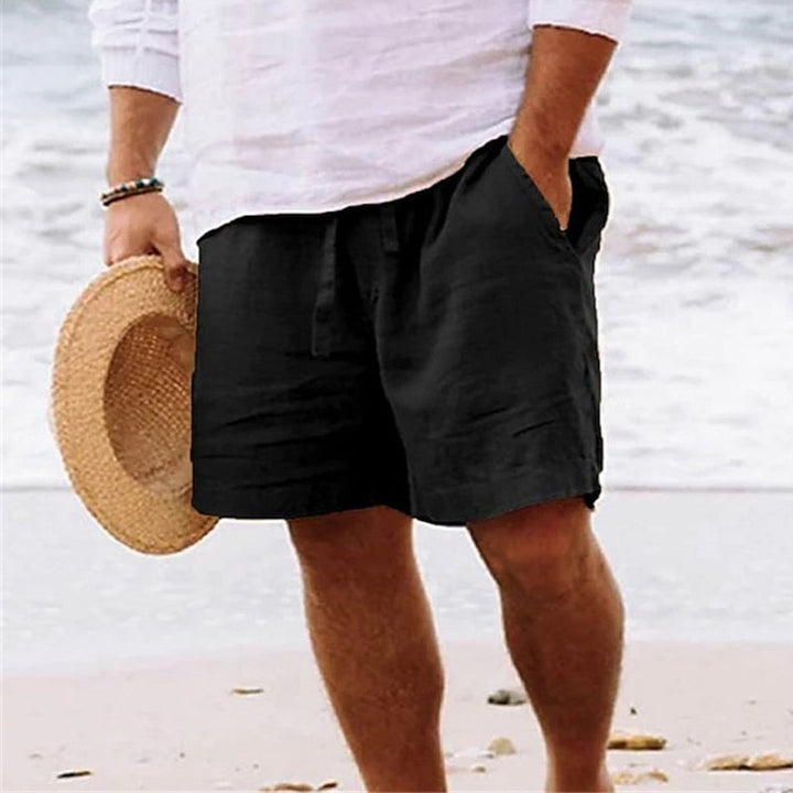 Durable men's chino shorts, relaxed fit, drawstring waist & utility pockets for summer fashion.