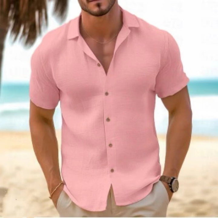 Men's relaxed fit short sleeve button-up shirt. Collared, casual, and comfortable for warm weather.