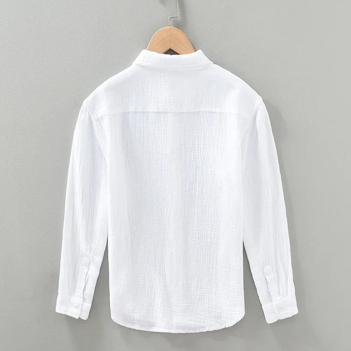 Soft grey men's cotton relaxed fit button-down shirt, perfect as a breathable summer top.