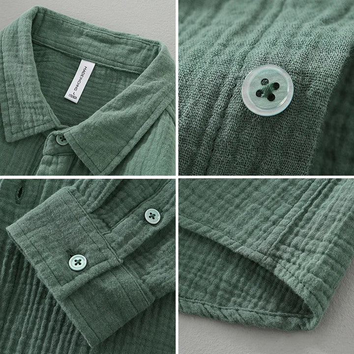 Detail of the fabric on a men's breathable cotton relaxed fit button-down shirt, close-up.