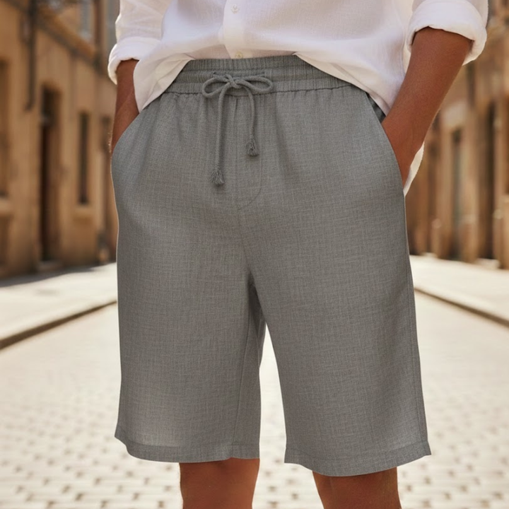 Men's relaxed fit drawstring summer shorts for casual warm weather comfort. Perfect knee-length everyday wear.