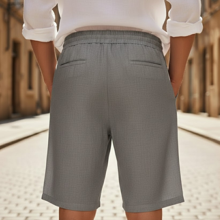 Lightweight men's relaxed fit summer shorts with drawstring, ideal for beach, casual outings & warm weather.