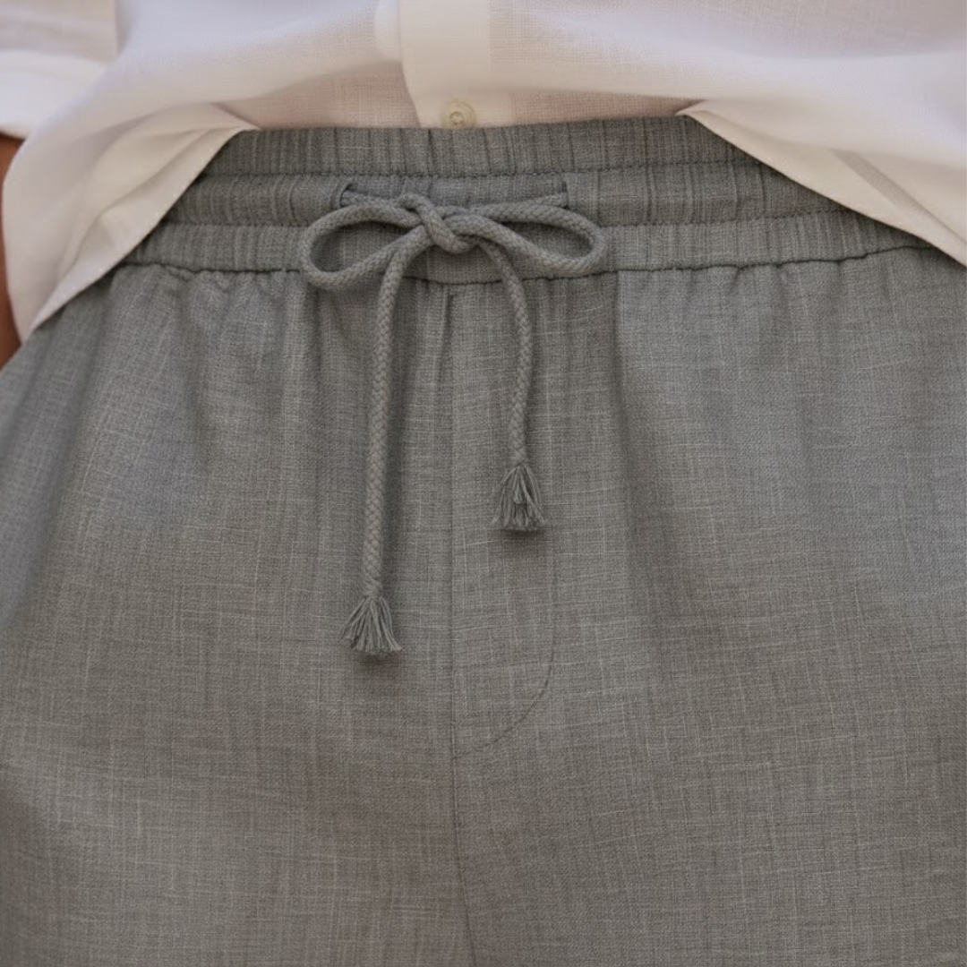 Comfortable men's relaxed fit drawstring shorts. Stylish casual wear, perfect knee-length for summer days.