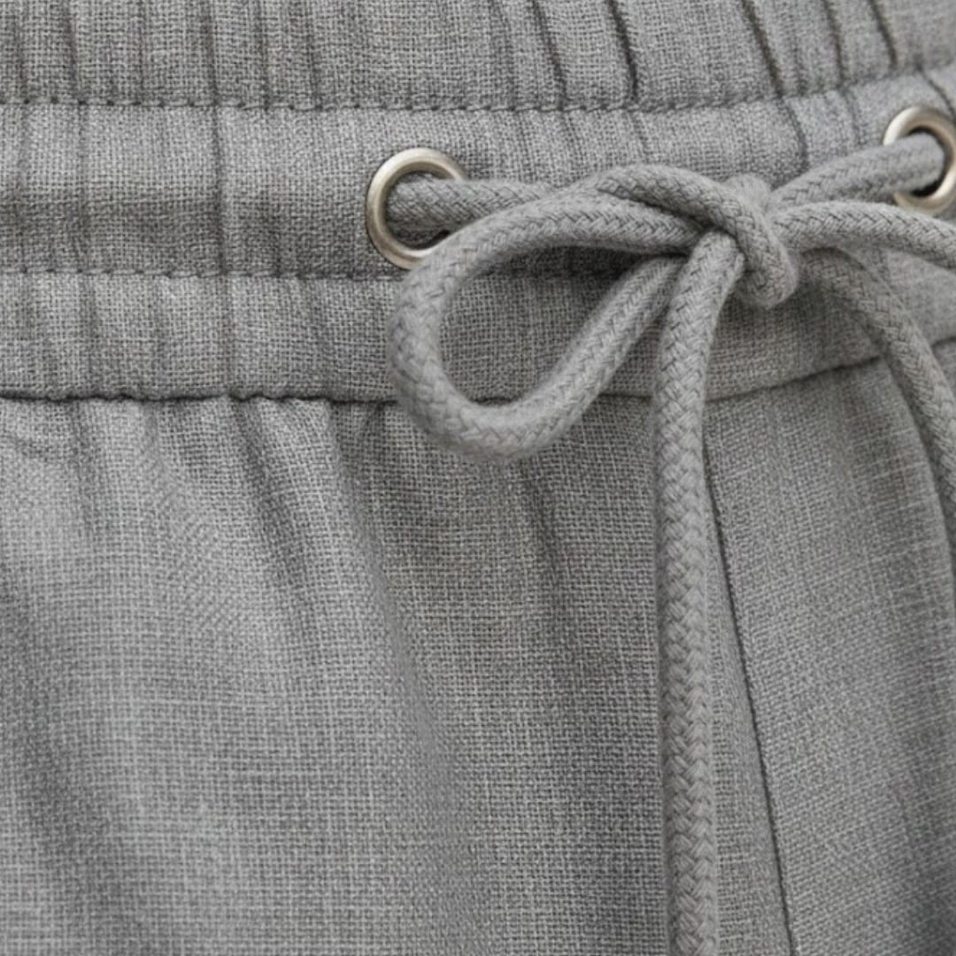 Men's relaxed fit drawstring shorts, comfortable knee-length design. Ideal for summer, beach, and everyday casual wear.