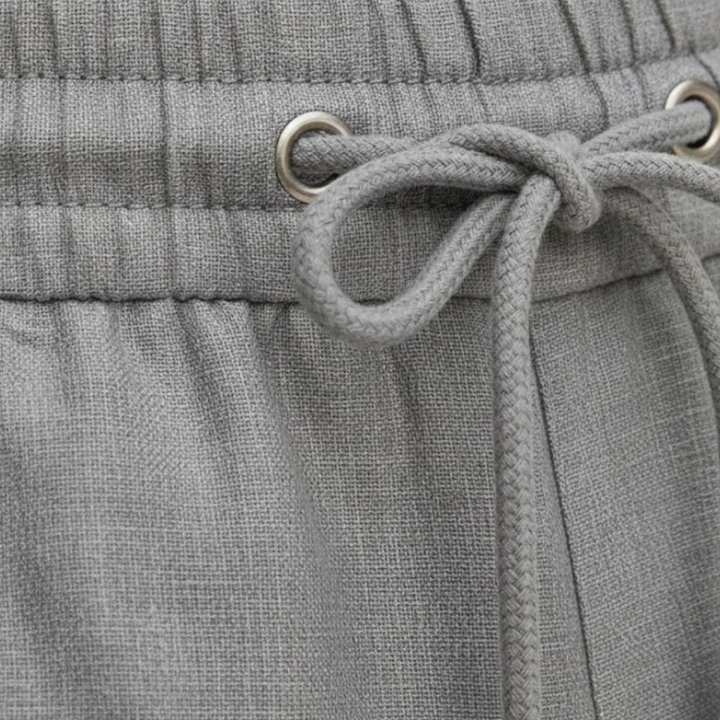 Men's relaxed fit drawstring shorts, comfortable knee-length design. Ideal for summer, beach, and everyday casual wear.