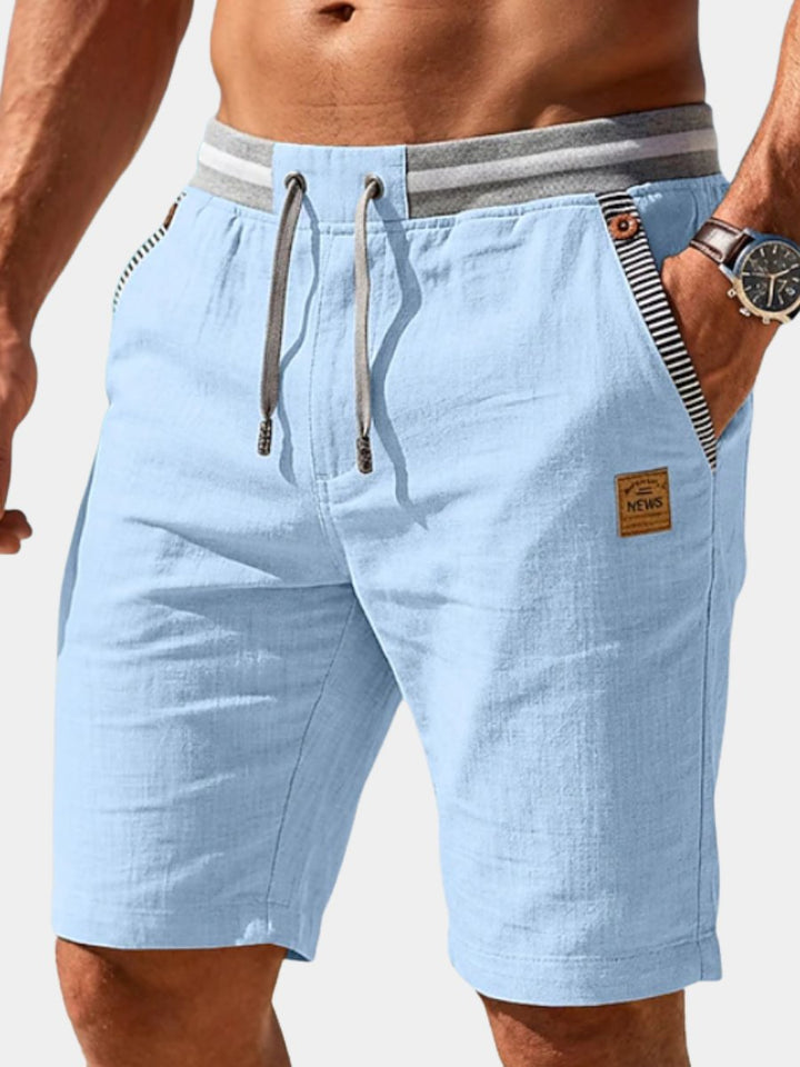 Men's relaxed fit drawstring summer shorts. Ideal for casual wear, comfort, and warm weather fashion.