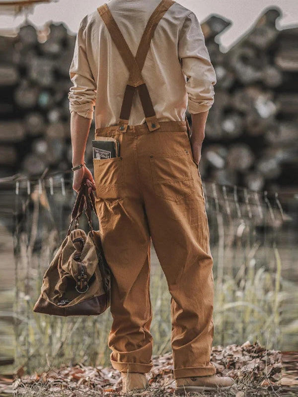 White men's comfortable relaxed fit overalls, perfect for casual wear. Full length design with adjustable straps for ease.