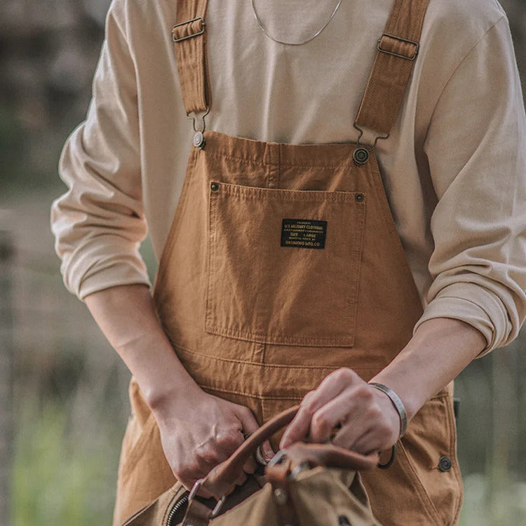 Men's relaxed fit overalls, versatile for casual wear or workwear style. Comfortable full-length design with adjustable straps.