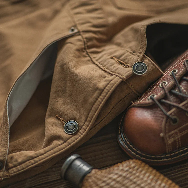Stylish men's relaxed fit fashion overalls, a comfortable full-length jumpsuit with utility pockets for everyday wear.