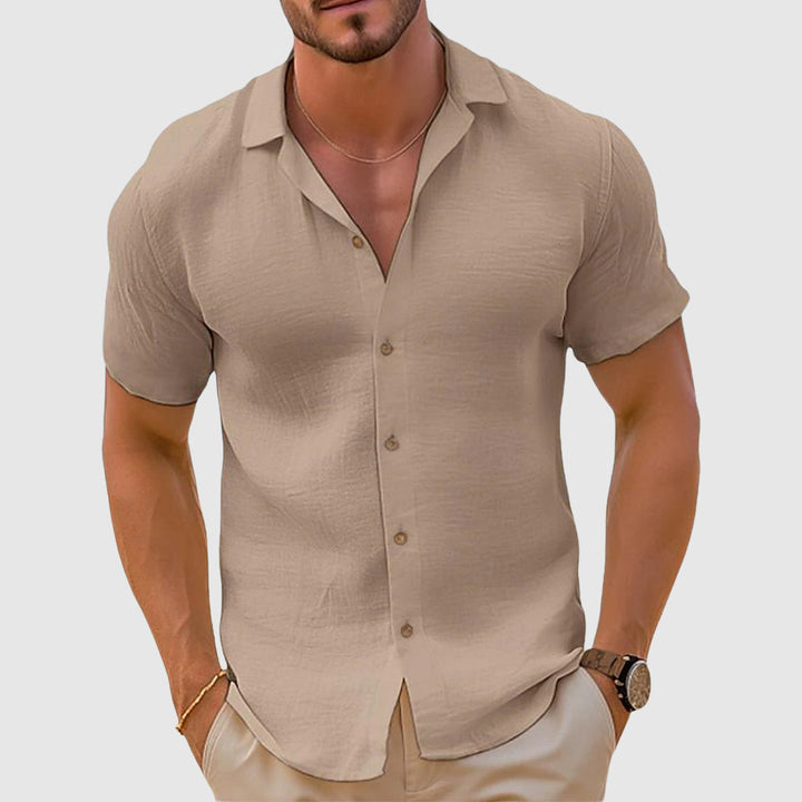 Men's relaxed fit linen button-down shirt. Comfortable long-sleeve casual shirt for summer & beach style.