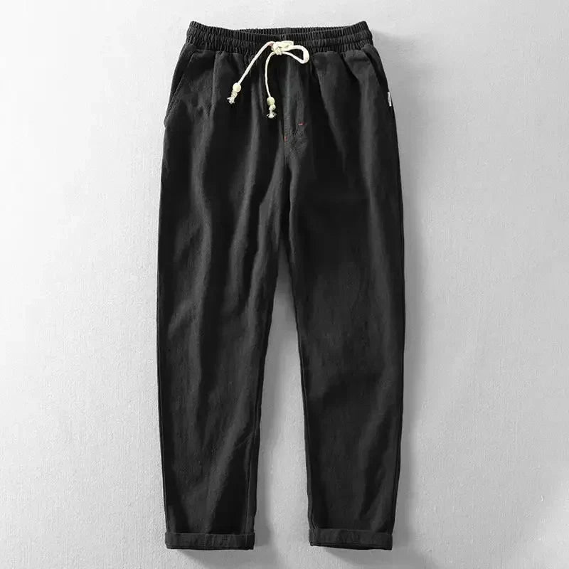 Men's relaxed fit linen jogger pants in light beige, perfect for casual summer comfort with drawstring waist