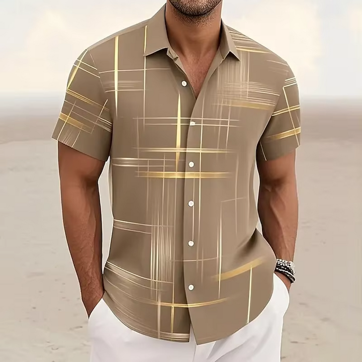 Trendy men's geometric print polo shirt. Short sleeve, relaxed fit, button-front design for stylish casual wear.