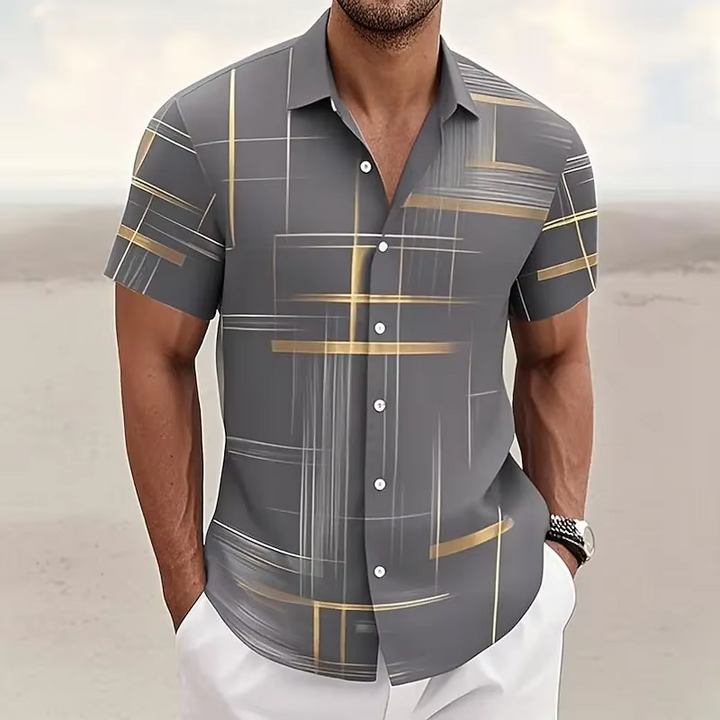 Lightweight men's geometric print polo, relaxed fit. Stylish short sleeve top for summer outings & casual fashion.