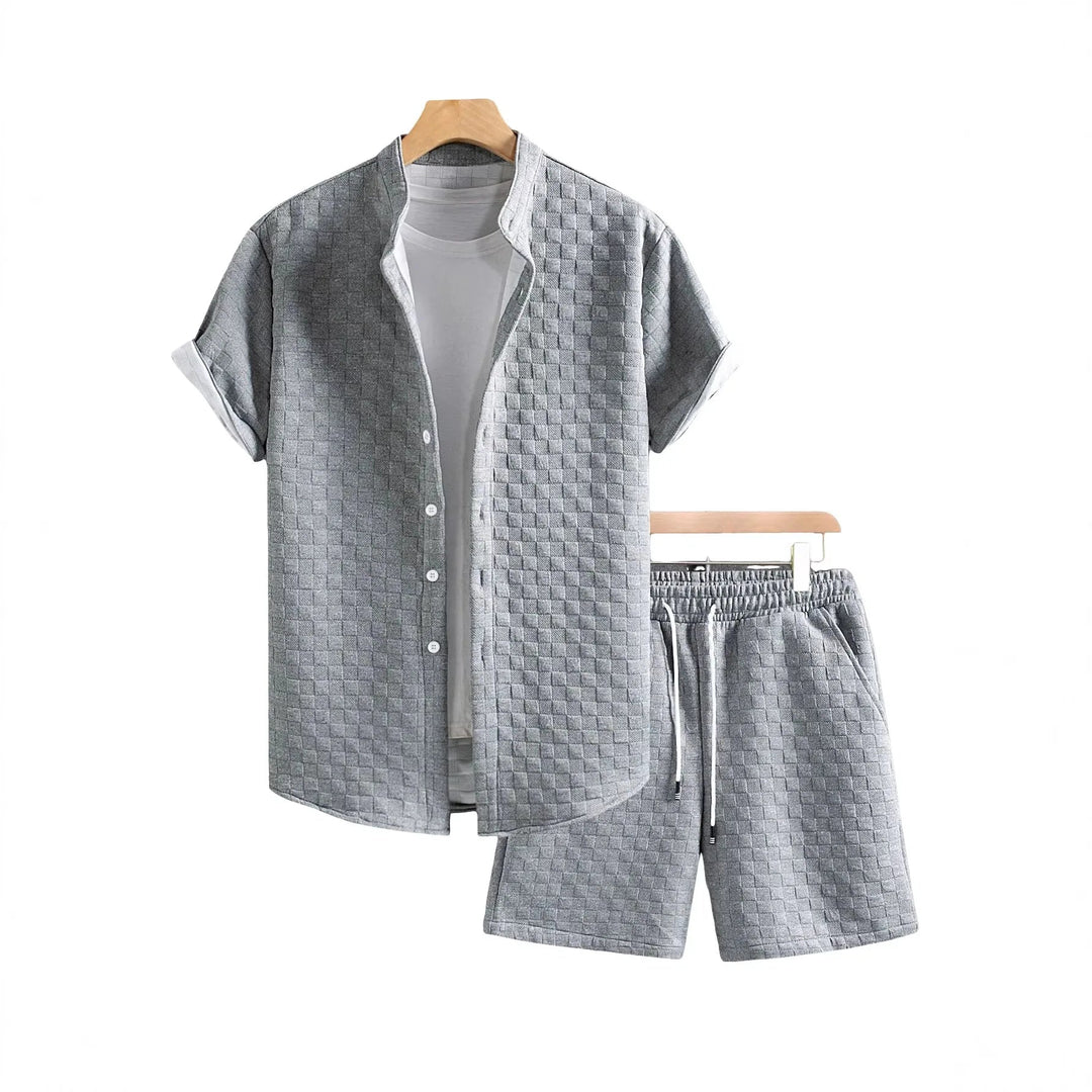 Stylish men's two-piece casual shorts set, ideal for spring travel or a comfortable summer fashion look.
