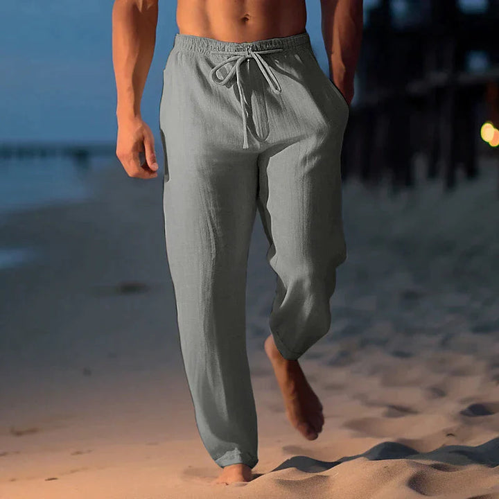 Men's relaxed fit summer comfort pants in a light color, ideal for casual wear.