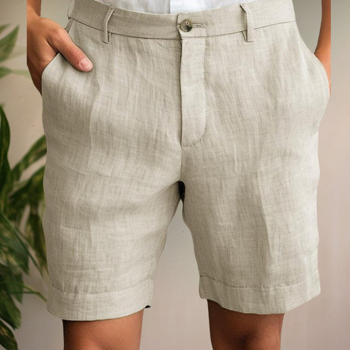 Men's relaxed fit summer shorts in a light color, perfect for casual comfort and warm weather style.