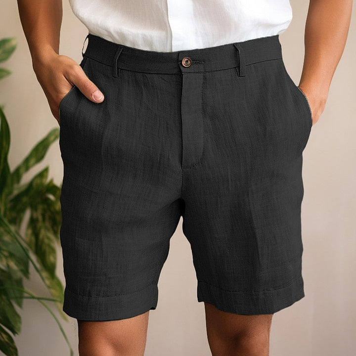 Man wearing comfortable relaxed fit summer shorts, enjoying a casual day, perfect for warm weather.