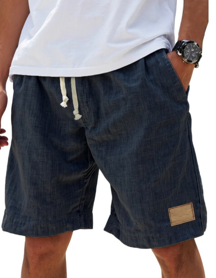 Men's summer relaxed fit shorts, comfortable drawstring design for casual beachwear.