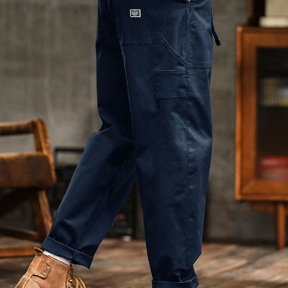 Stylish khaki men's relaxed fit utility pants, combining comfort with practical design.