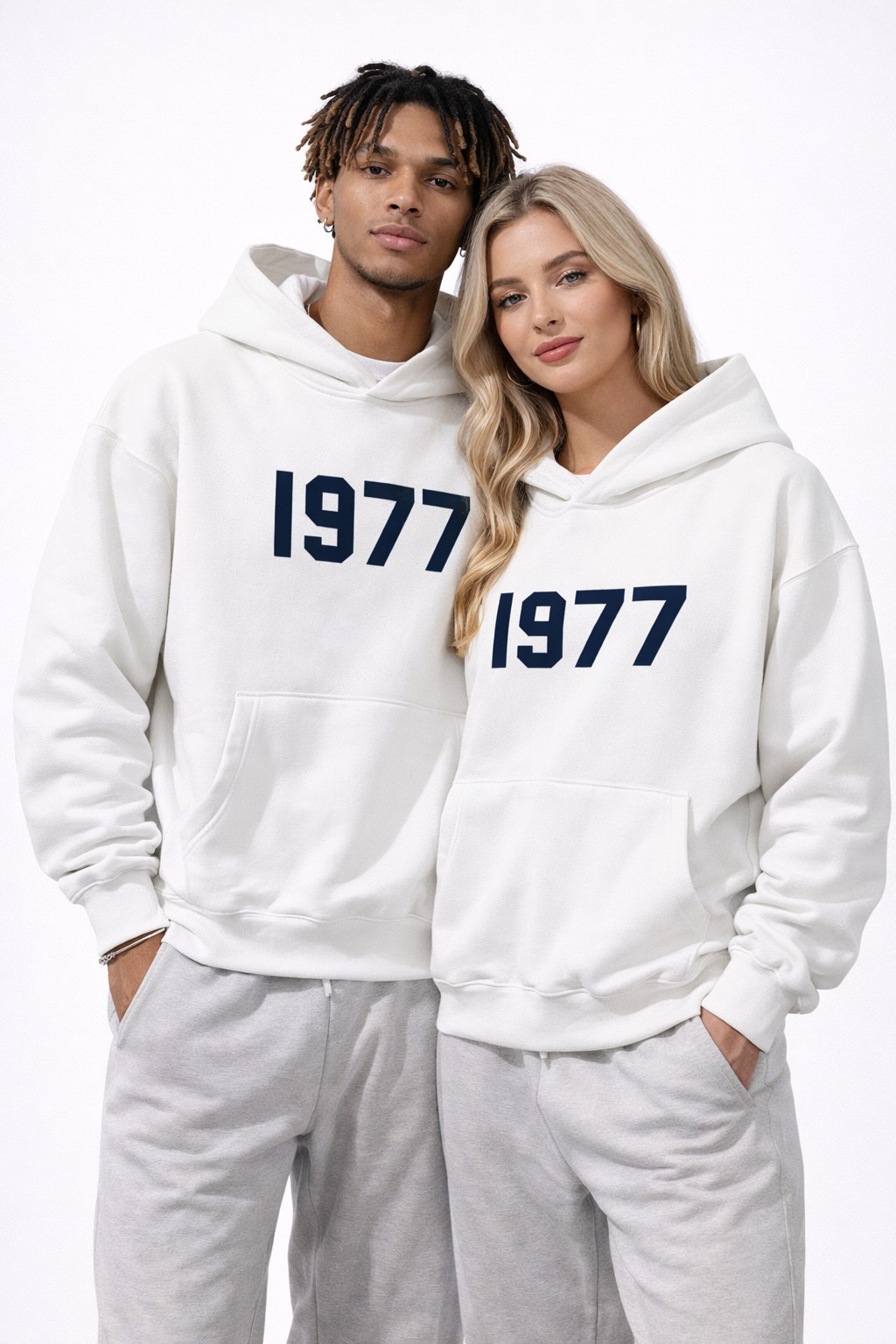 Side view of men's retro 1977 raglan hoodie, highlighting the unique sleeve design and vintage print.