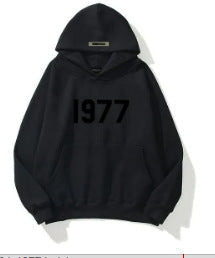Comfort-fit men's raglan sleeve pullover hoodie, ideal for casual winter streetwear with a retro vibe.