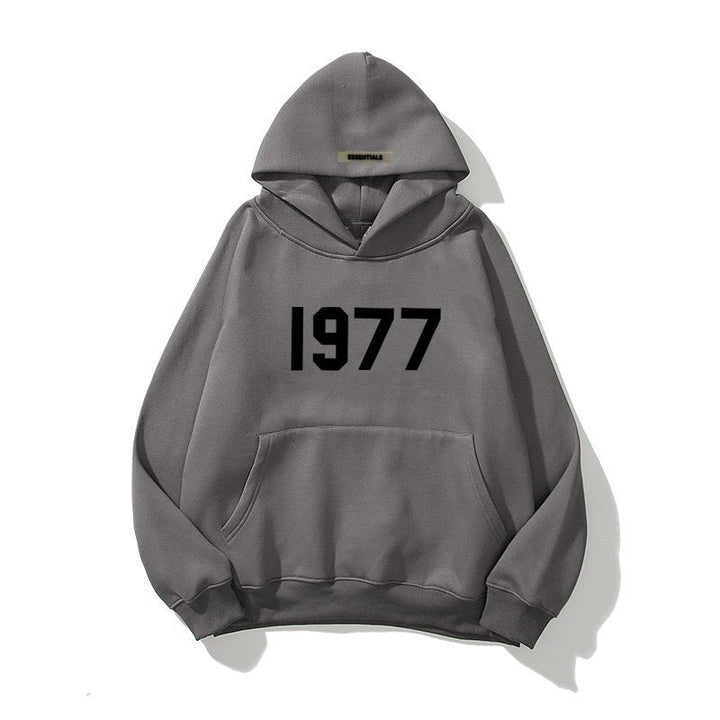 Soft men's retro 1977 raglan hoodie, perfect for casual everyday streetwear and vintage fashion.
