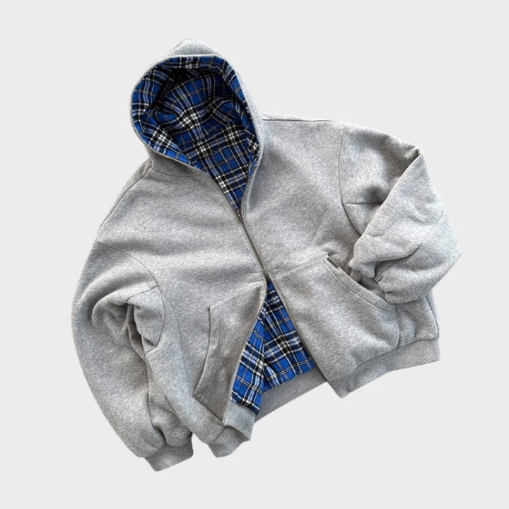 Oversized men's hooded sweatshirt, reversible for two urban fashion looks. Comfortable casual streetwear.
