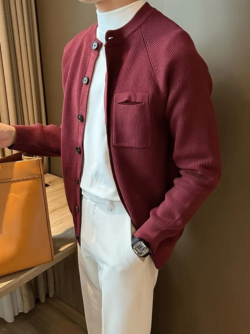 Classic men's ribbed knit cardigan, button-front design with long sleeves and chest pocket for everyday wear.