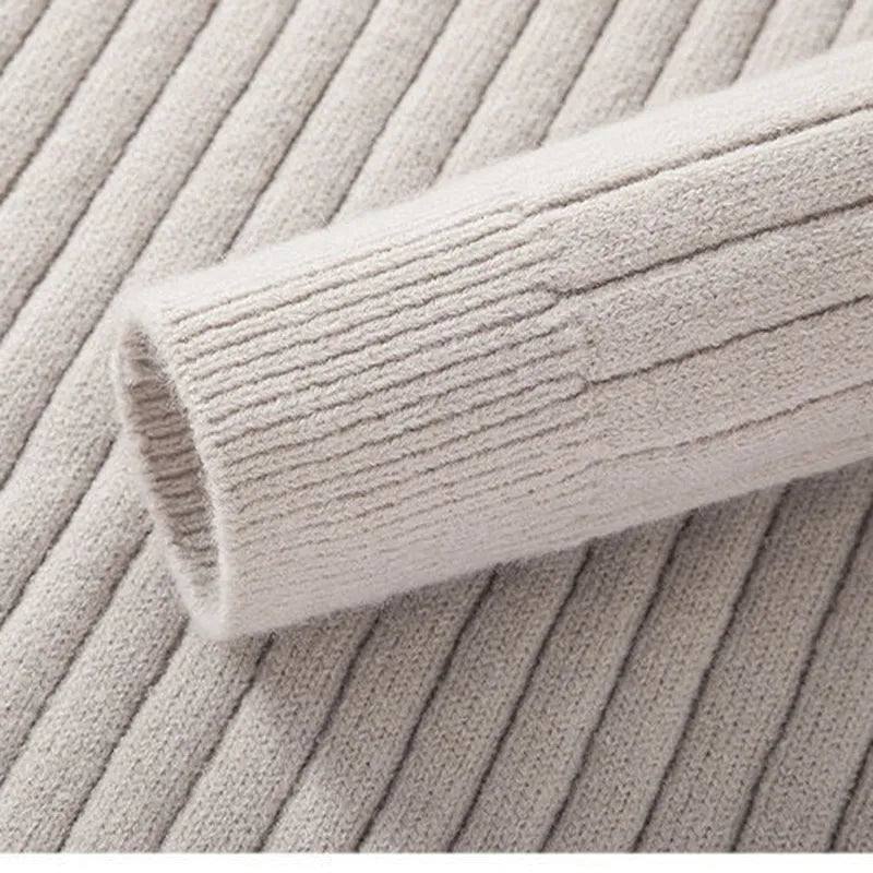 Casual yet sophisticated men's ribbed half-zip sweater in a modern knitwear design.