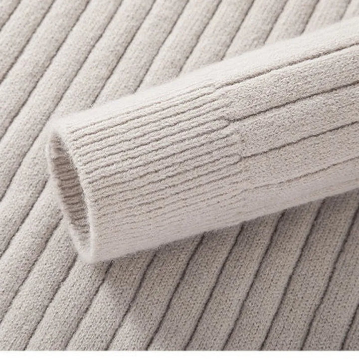 Casual yet sophisticated men's ribbed half-zip sweater in a modern knitwear design.