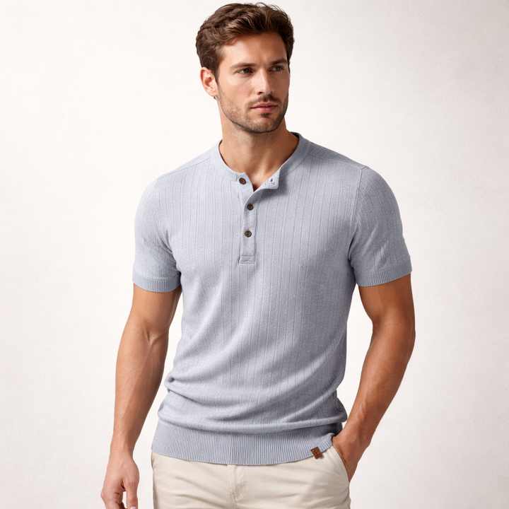 Stylish men's short-sleeve henley in a comfortable ribbed knit, perfect for versatile everyday wear.