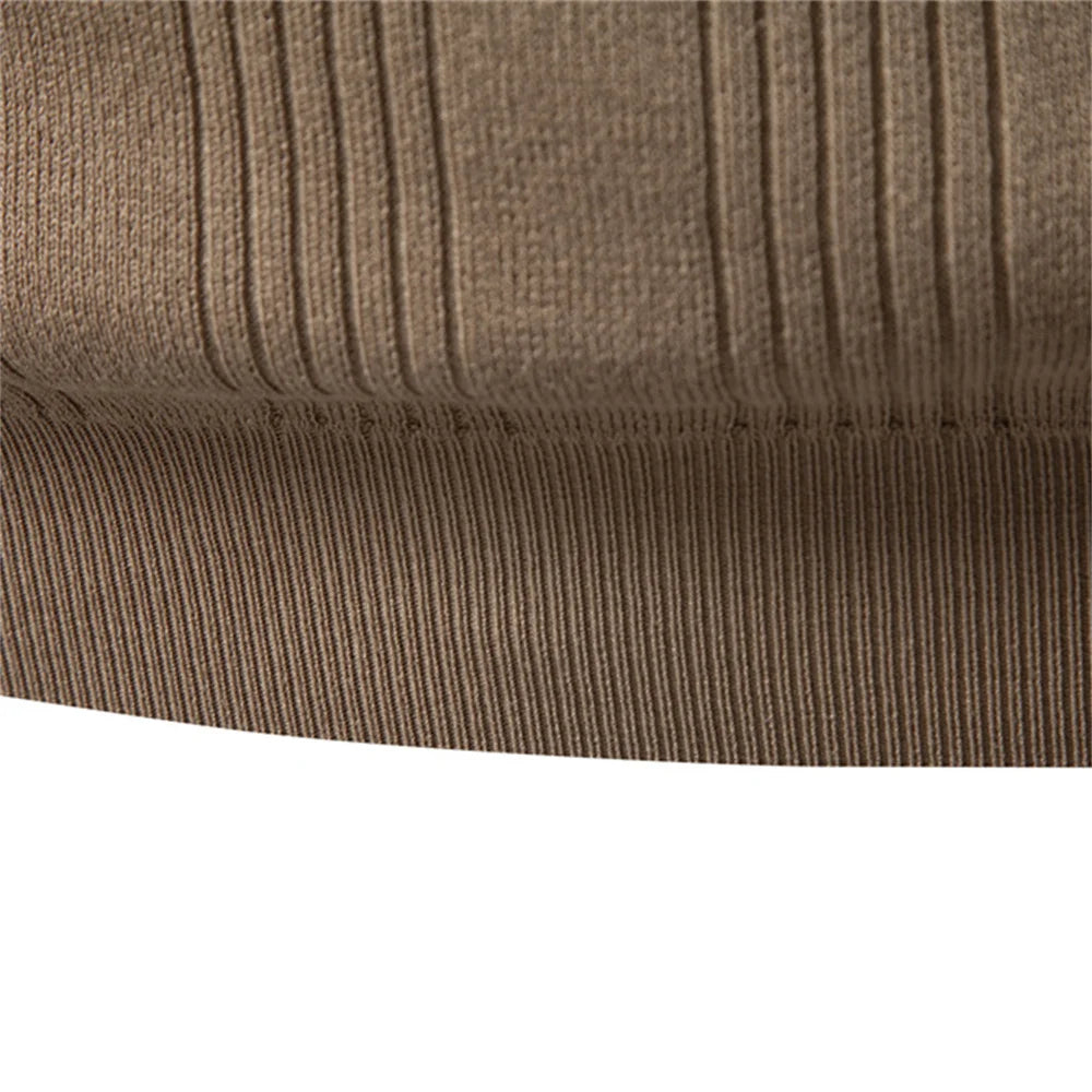 Versatile men's ribbed henley in grey, offering a comfortable fit for casual wear and smart-casual looks.