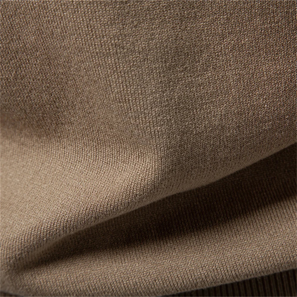 Front view of a men's short-sleeve ribbed henley, combining effortless style with ultimate comfort for any occasion.