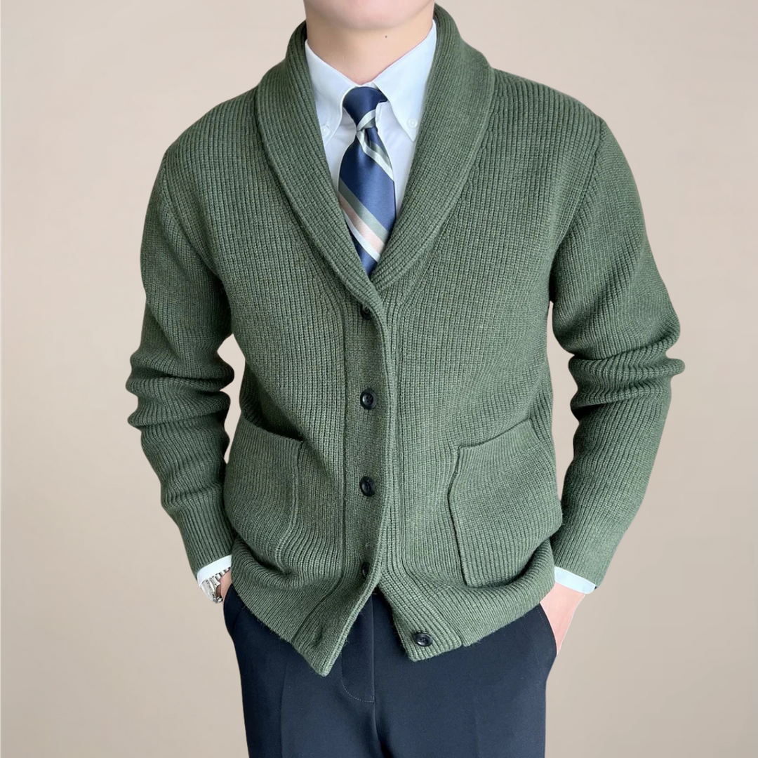 Stylish men's long sleeve ribbed knit cardigan sweater. Features a smart shawl collar and button-up front for versatility.