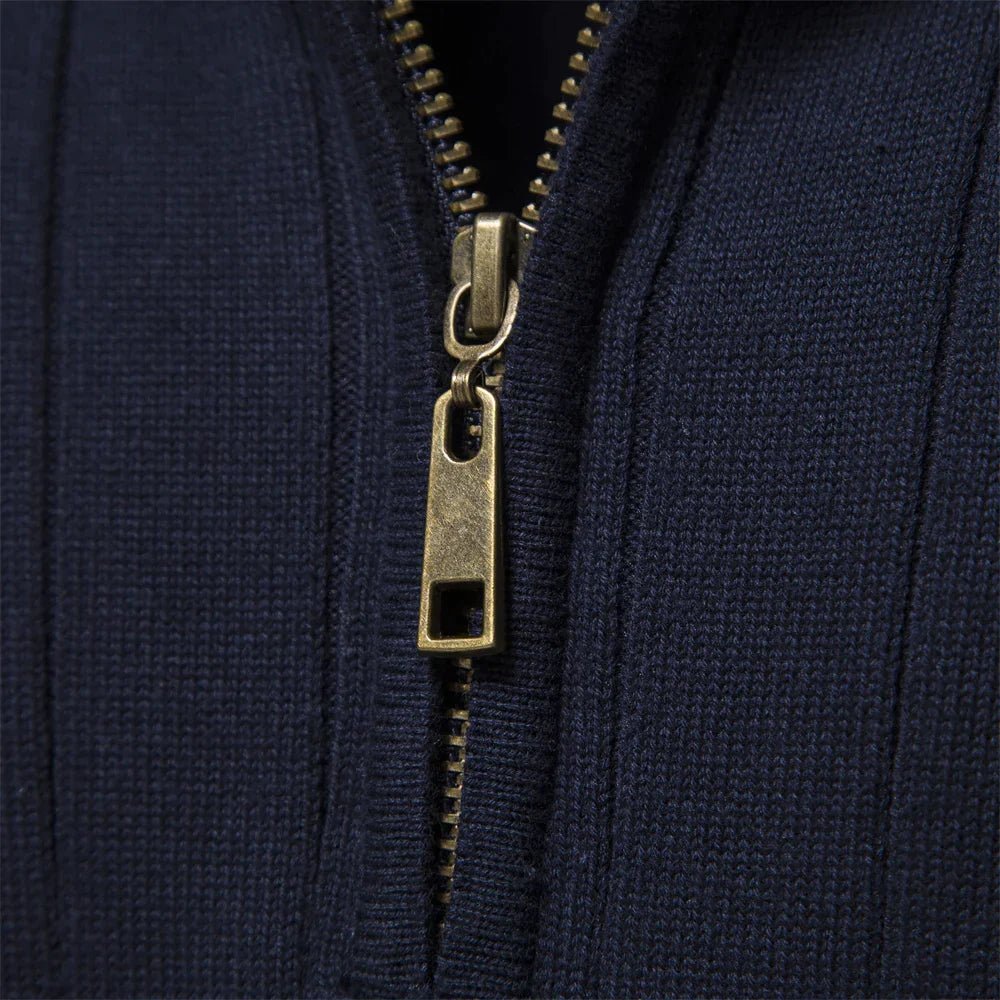 Close-up of men's ribbed mock neck half zip sweater, showcasing texture, long sleeves, and quality.