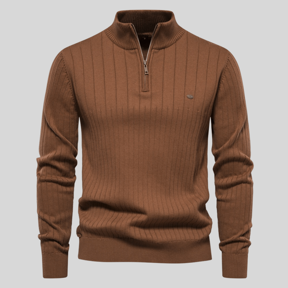 Man wearing stylish ribbed mock neck half zip sweater, ideal for casual outings or office wear.