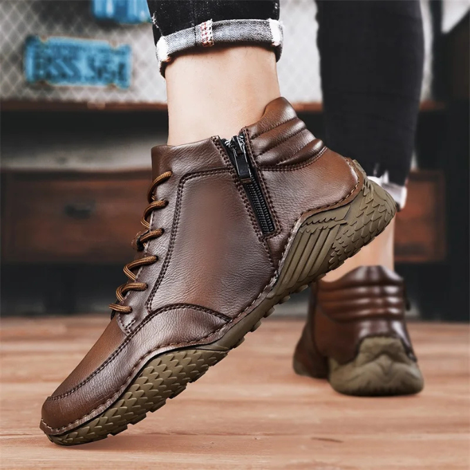 Men's Rover leather ankle boots showcasing a side zipper for easy wear and a cushioned fit.