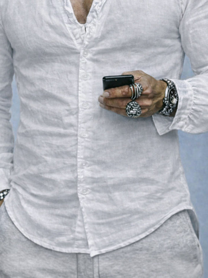 Casual men's fashion: long sleeve slim fit shirt with a unique ruffled neck design, great for a modern look.