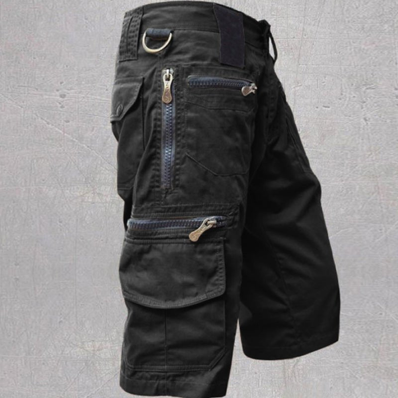Rugged men's cargo shorts for outdoor adventures, featuring multiple pockets for travel and everyday utility.