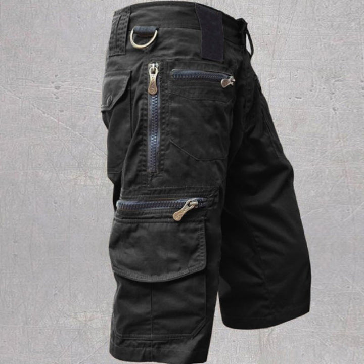 Rugged men's cargo shorts for outdoor adventures, featuring multiple pockets for travel and everyday utility.